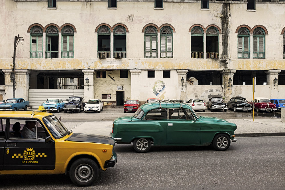 The yellow cab above is an "official" taxi, you might be lucky enough to get one with A/C at the airport!