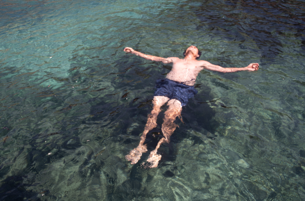 photo of my handsome husband by moi off the coast of Antiparos, Greece